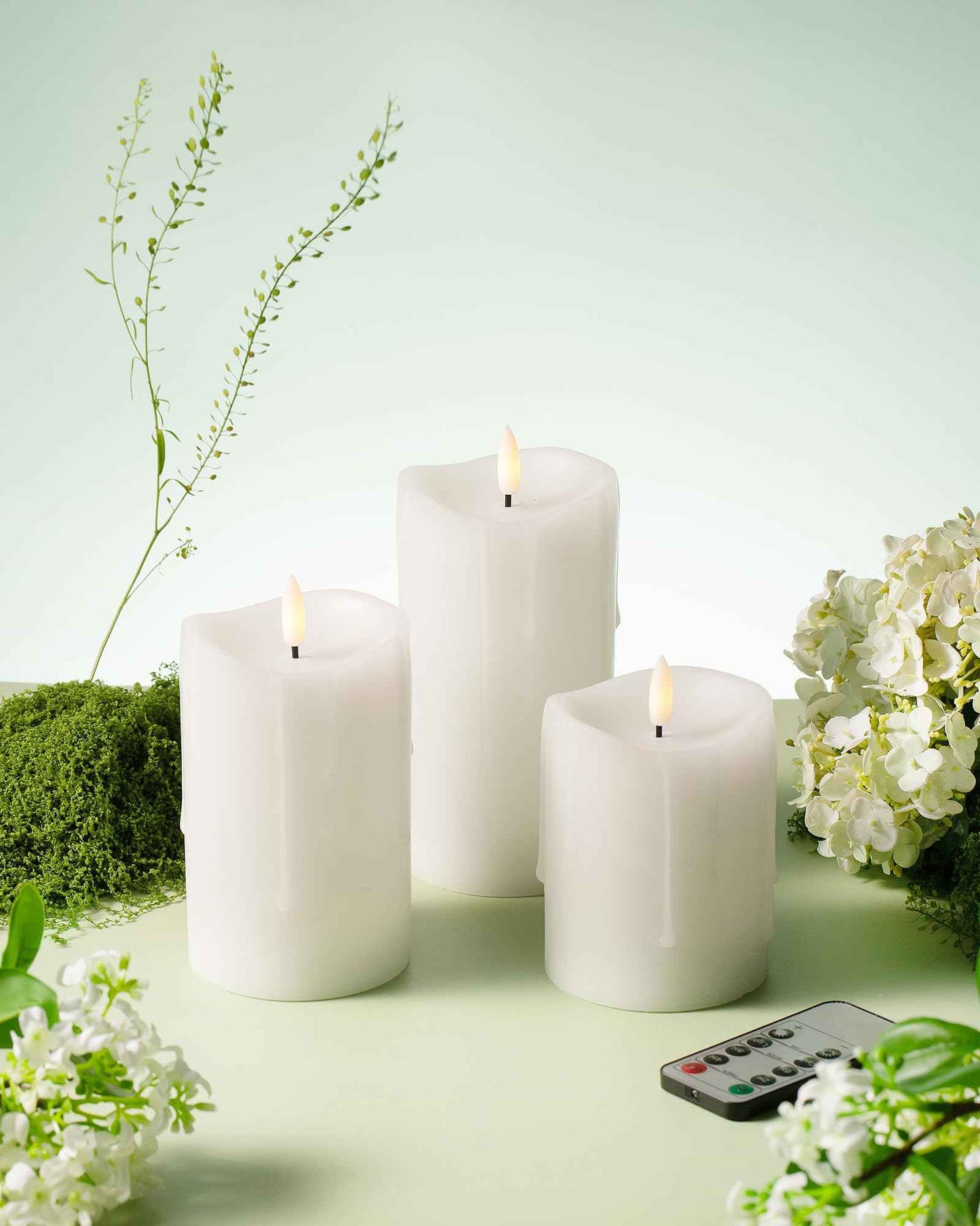 Velsyn White Flameless Candles with Remote and Timer, Real Wax Made Wax Drip LED Pillar Candles Battery Operated with 3D Flickering Flame Melted Top - 3" x 4", 3" x 5", 3" x 6" - Set of 3