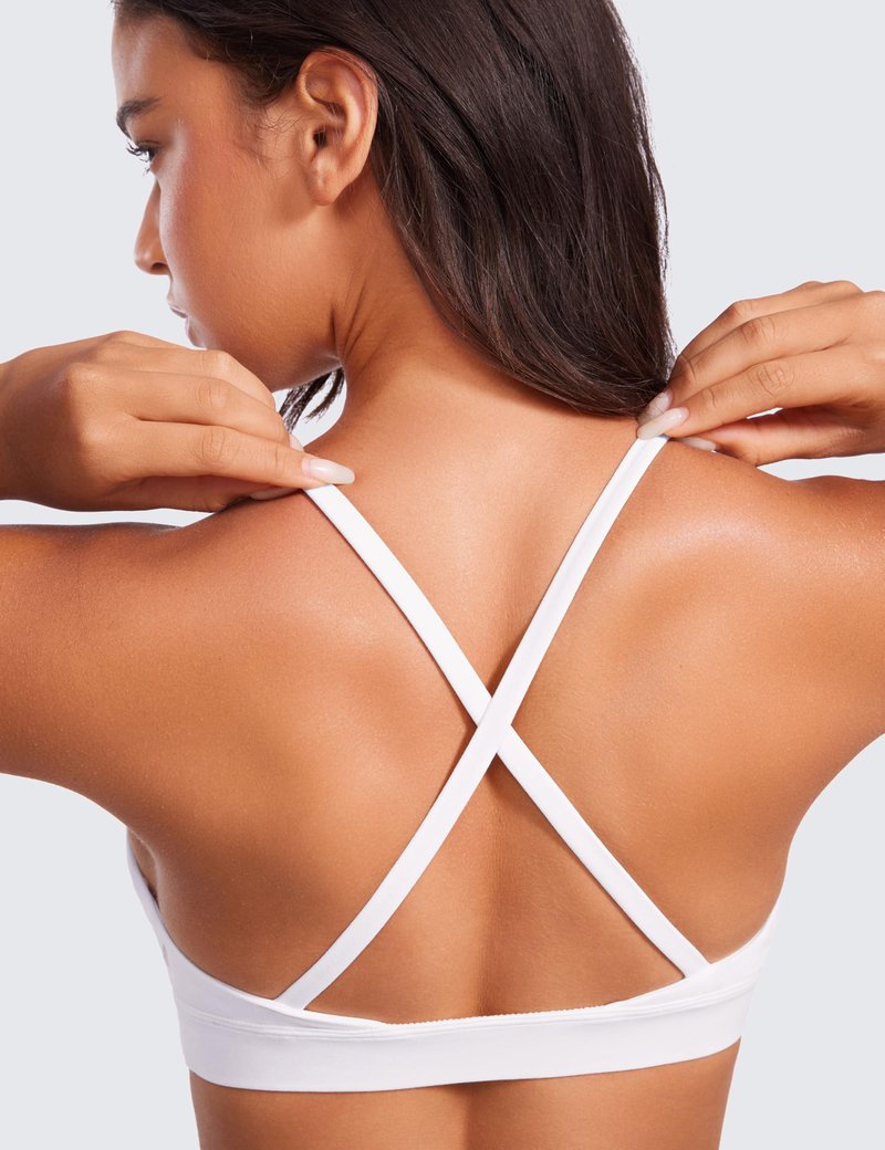 CRZ YOGA Butterluxe Deep V-Neck Sports Bras for Women - Spaghetti Strap Criss Cross Padded Top Low Coverage Wireless Yoga White Medium