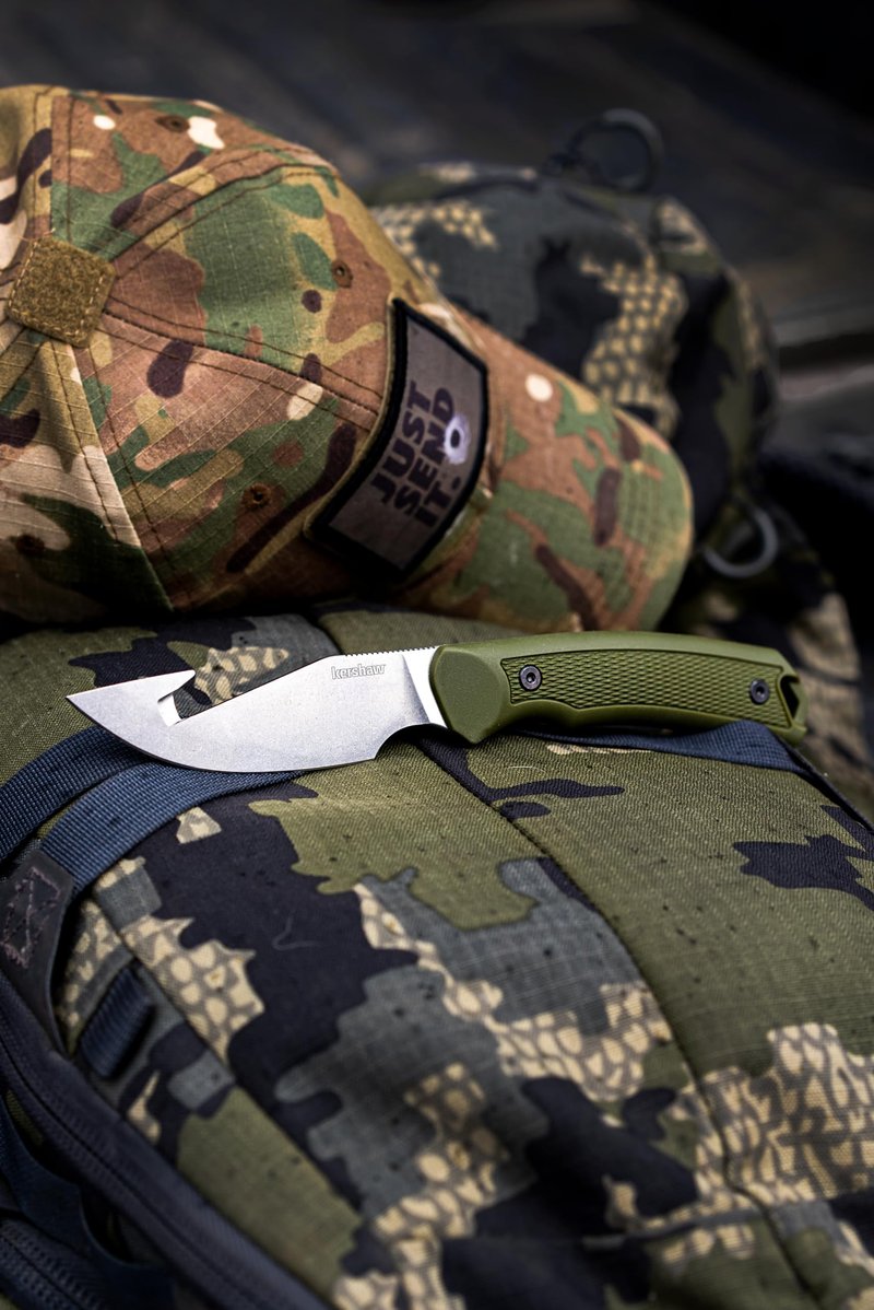 Kershaw Deschutes Skinner Gut Hook Fixed Blade Knife, Olive Design, 3.9 Inch Steel Fixed Drop Point Blade with Gut Hook, Full Tang Design, EDC, Molded Sheath, Everyday Carry Knife for Men and Women