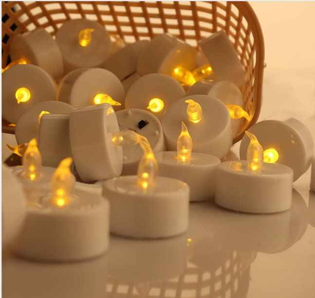 YIWER Tea Lights LED Tea Light Candles 200 Hours Pack of 400 Realistic Flickering Bulb Battery Operated Tea Lights for Seasonal Festival Celebration Electric Fake Candle in Warm Yellow