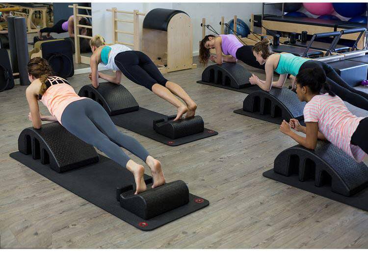 Spine Corrector - Professional Pilates Equipment for Back Pain Relief - Pink