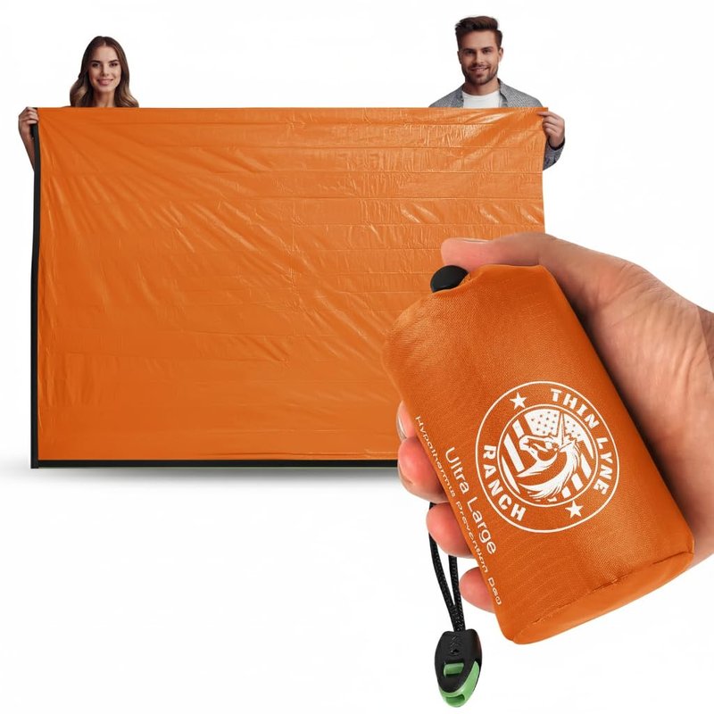ThinLyneRanch Ultra-Large Waterproof Emergency Sleeping Bag for Survival - Hypothermia Prevention & Shelter - Multi-Person Bivvy Sack - Ideal Survival Gear, Emergency Bivy Camping Essentials (Orange)