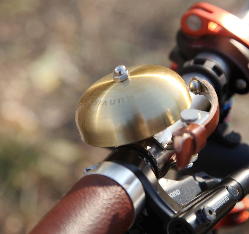 Sunviil Bike Bell Brass Bicycle Bell Produces a Clear resonant Sound, with Leather Finger Protection, Suitable for Handle 22.2-31.8mm City Bike Cruiser Road Bike Mountain Bike