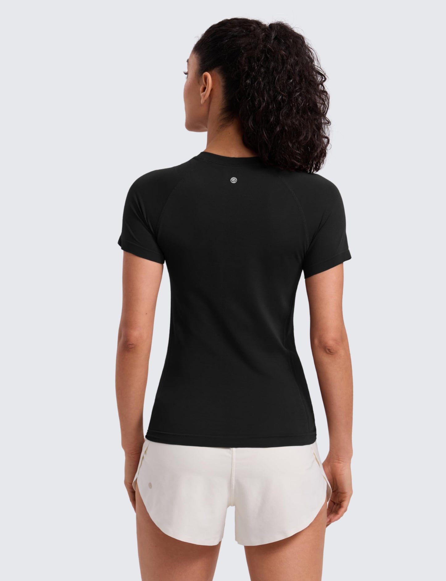 CRZ YOGA Seamless Workout Tops for Women Hip Length - Athletic Running Gym Yoga Short Sleeve Shirts Breathable Crewneck Tees Hibiscus Purple Medium
