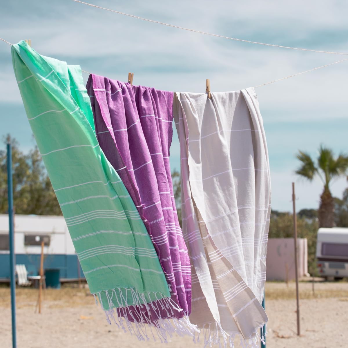 BAY LAUREL 4-Pack Oversized Turkish Beach Towels – Quick Dry, Sand Free Towels with Travel Bags, 39"x71", Lightweight (Pack of 4 - Denim Blue)