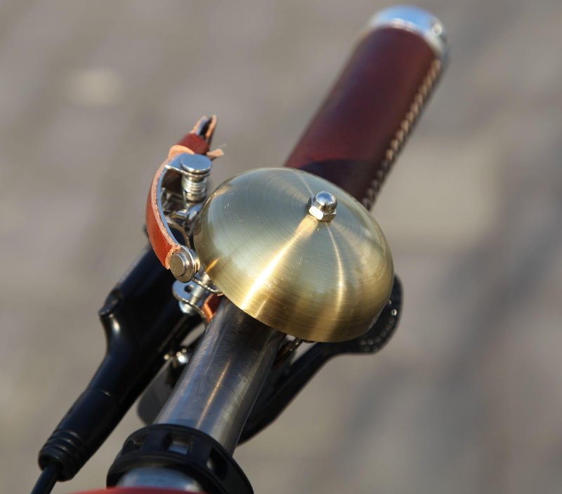 Sunviil Bike Bell Brass Bicycle Bell Produces a Clear resonant Sound, with Leather Finger Protection, Suitable for Handle 22.2-31.8mm City Bike Cruiser Road Bike Mountain Bike