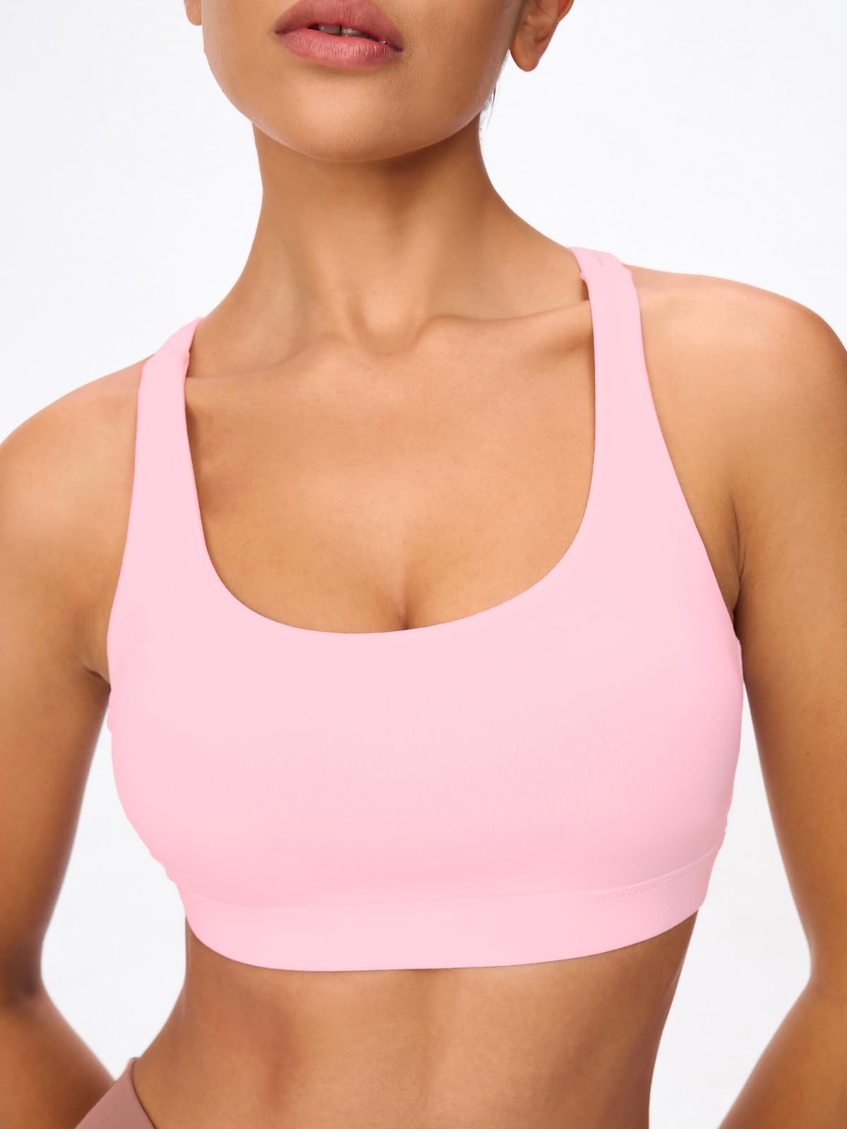 Omwilddo Women's Strappy Sports Bras Light Compression Crop Criss Cross Back Padded Workout Yoga Bra Supportive U Neckline Light Pink M