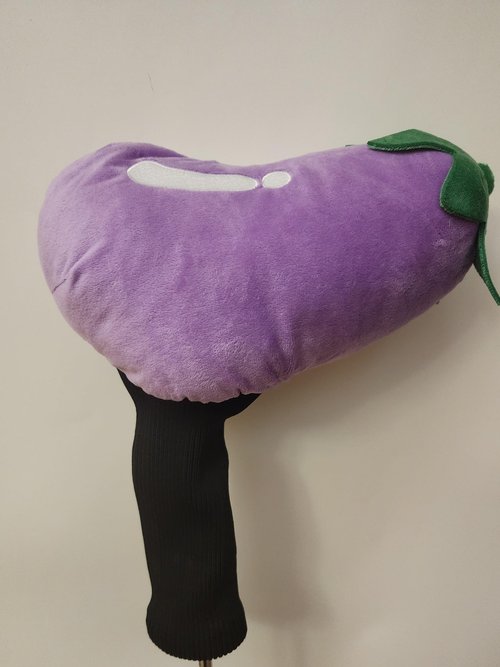 Eggplant Enigma Golf Club Head Cover Dive into The Eggplant Enigma: A crude golf club head cover That adds fun to special occasions and every swing for golf enthusiasts!