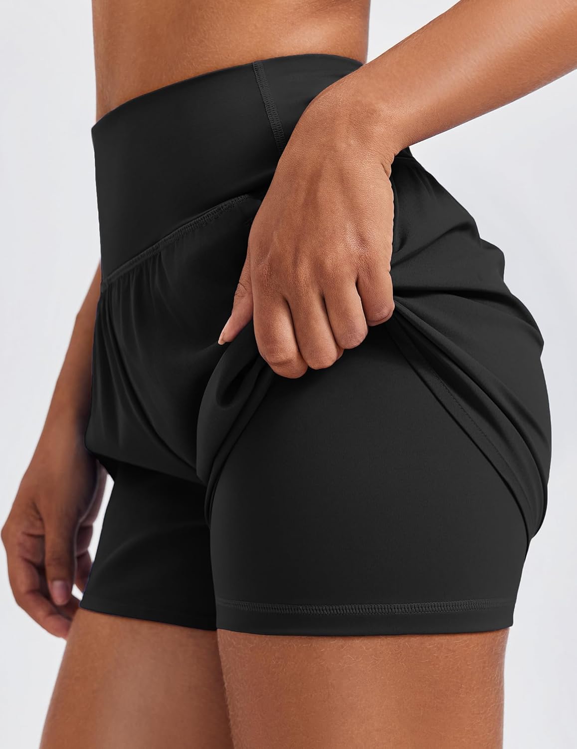 PINSPARK Women's 2-in-1 High Waisted Running Shorts - Quick Dry Dolphin Hem with 2 Zip Pockets