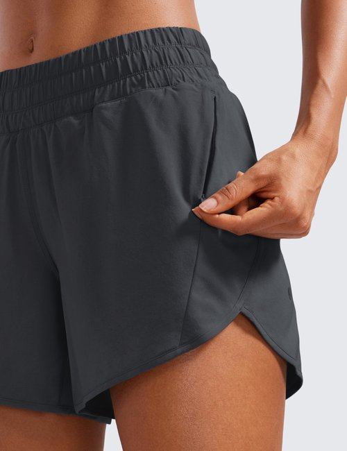 CRZ YOGA Dolphin Athletic Shorts for Women 5" - High Waisted Quick Dry for Running Workout Gym Track with Zip Pocket Graphite Grey Medium