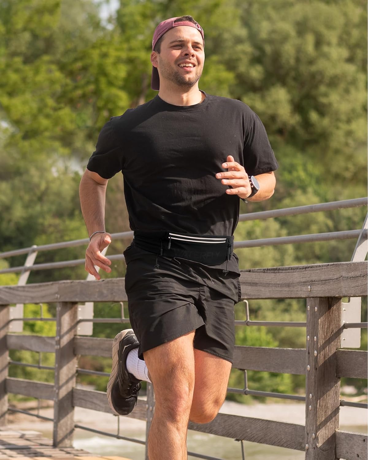 WATERFLY Running Belt - Breathable 3-Pocket Fanny Pack for Men & Women | Fits All Phones - Black