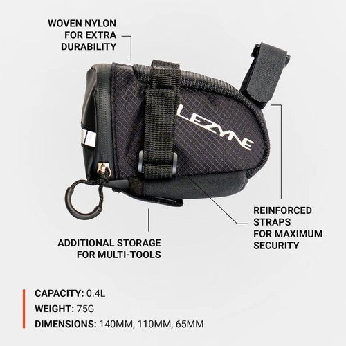 LEZYNE Caddy Bike Saddle Bag - Durable Nylon Cycling Storage Bag with Velcro/Quick Release Mount, Reflective Accents, Water-Resistant Zipper for Road Bikes & Commuters, Medium