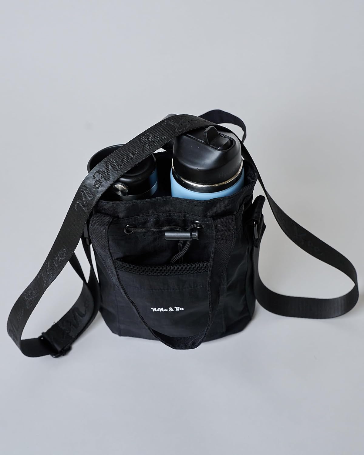 NoNa & Bee Water Bottle Holder - Hands-Free Crossbody Carrier Bag with Phone Pocket | Black