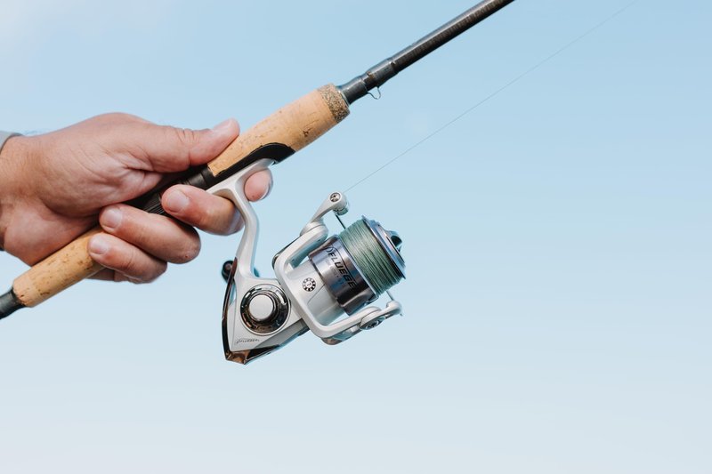 Pflueger Trion Spinning Reel, Size 20 Fishing Reel, Right/Left Handle Position, Graphite Body and Rotor, Corrosion-Resistant, Aluminum Spool, Front Drag System,Silver