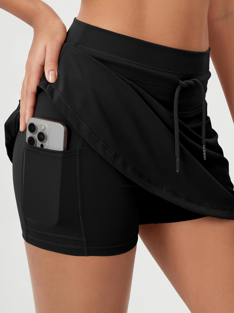 ODODOS Women's Drawstring Tie Skirts Built-in Shorts Athletic Golf Tennis Skorts with Ball Pocket, Black, Small