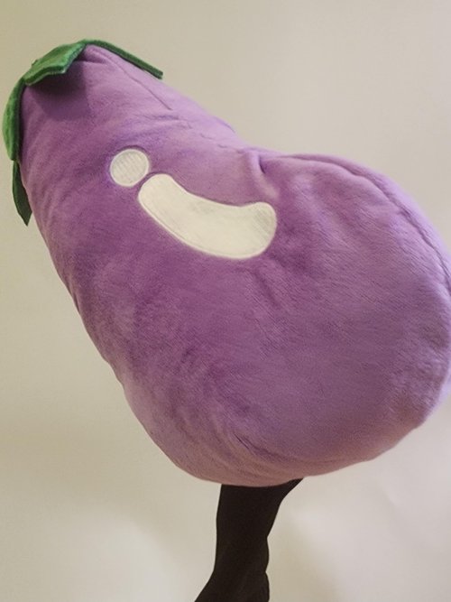Eggplant Enigma Golf Club Head Cover Dive into The Eggplant Enigma: A crude golf club head cover That adds fun to special occasions and every swing for golf enthusiasts!