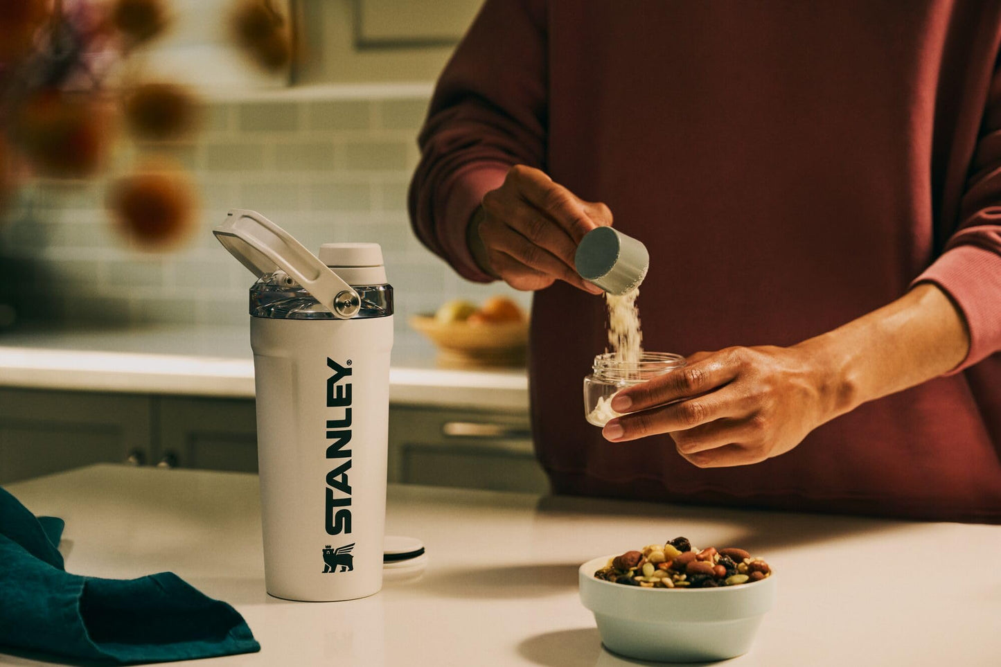 STANLEY Vitalize Shaker Bottle 20 oz | Leakproof Insulated Stainless Steel Shaker Cup | Base Storage and Twist On Fast Flow Lid | Protein Shakes and Pre Workout Powder | BPA-Free | Black
