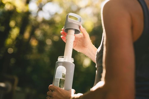 LifeStraw Go Series - Hand-Blown Glass Water Filter Bottle with Silicone Sleeve | 20oz, Aegean Sea