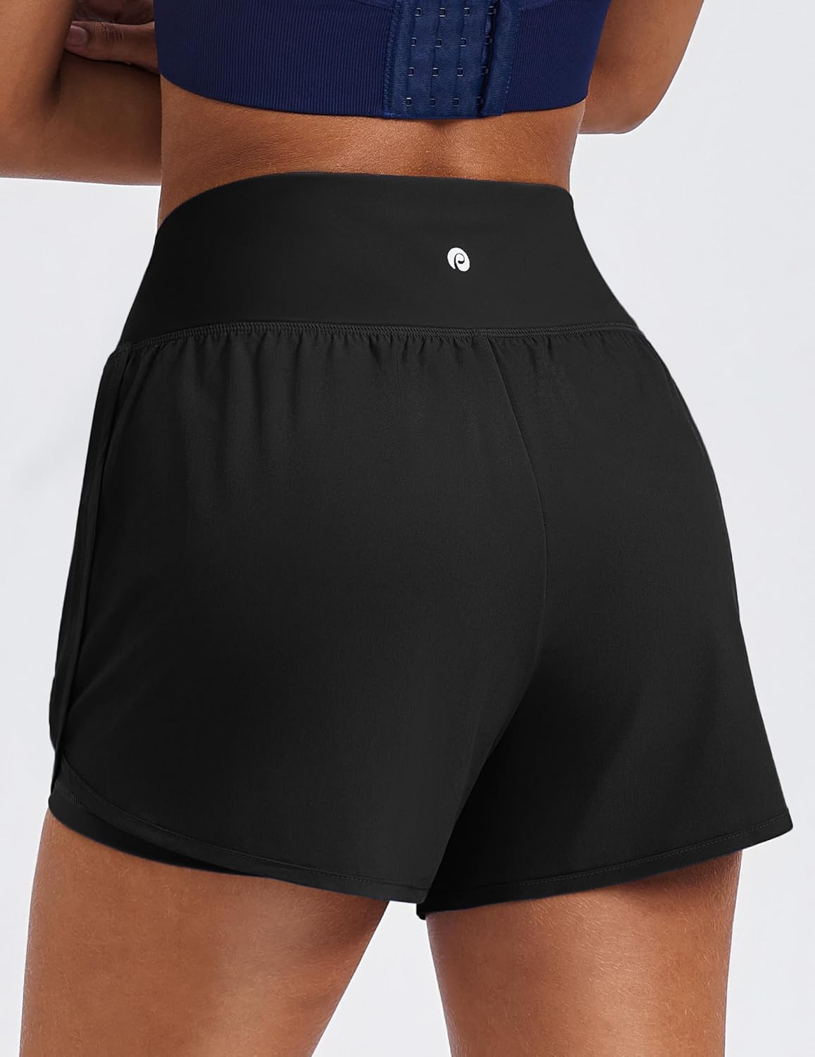 PINSPARK Women's 2-in-1 High Waisted Running Shorts - Quick Dry Dolphin Hem with 2 Zip Pockets