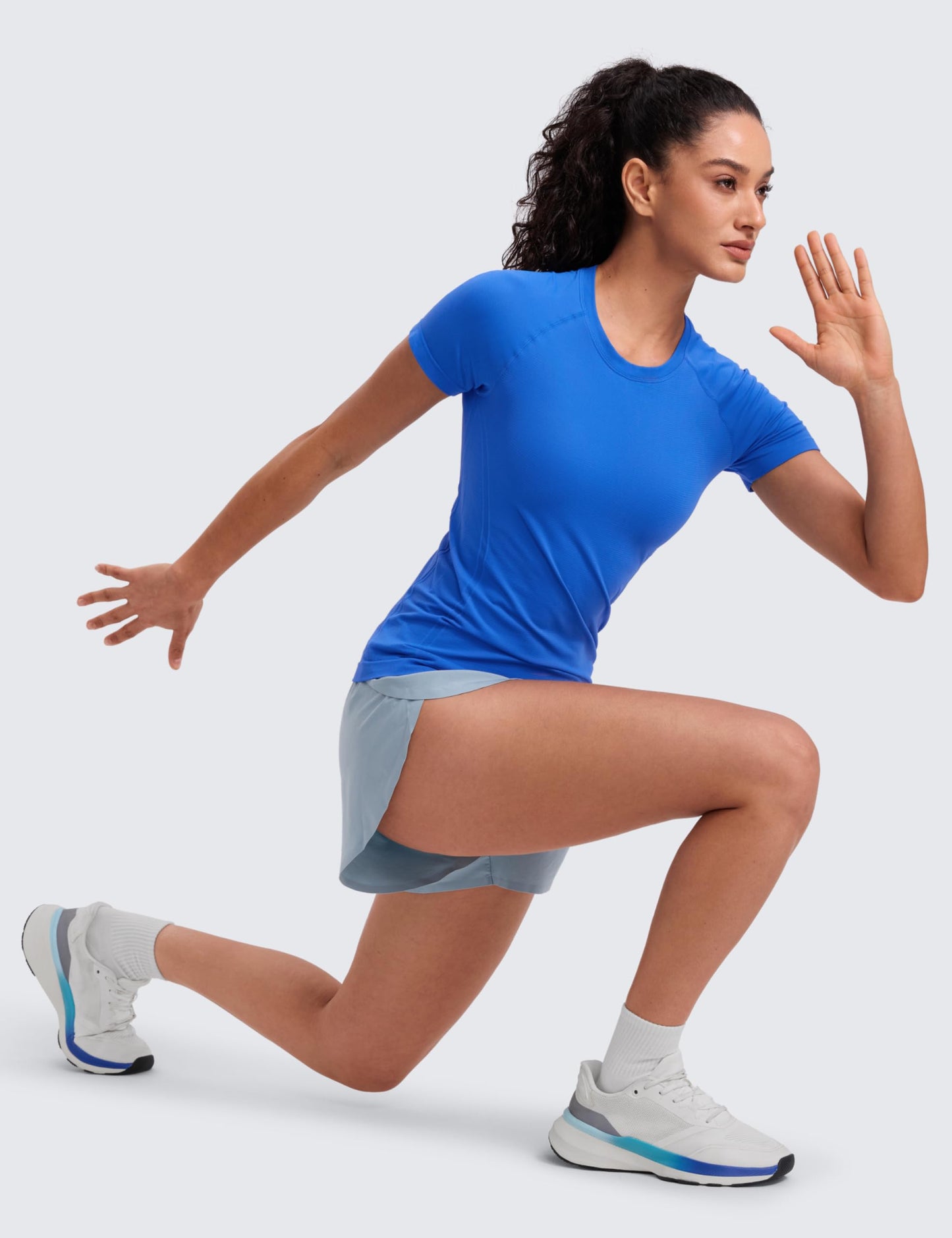 CRZ YOGA Seamless Workout Tops for Women Hip Length - Athletic Running Gym Yoga Short Sleeve Shirts Breathable Crewneck Tees Sparkle Blue X-Small