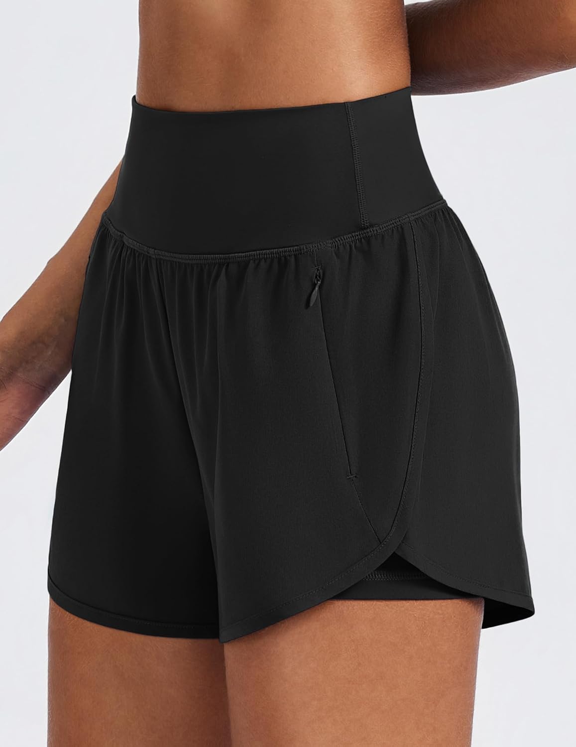 PINSPARK Women's 2-in-1 High Waisted Running Shorts - Quick Dry Dolphin Hem with 2 Zip Pockets