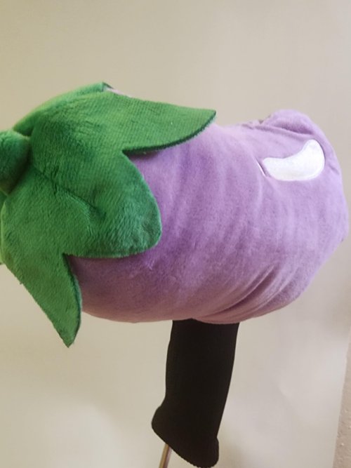 Eggplant Enigma Golf Club Head Cover Dive into The Eggplant Enigma: A crude golf club head cover That adds fun to special occasions and every swing for golf enthusiasts!