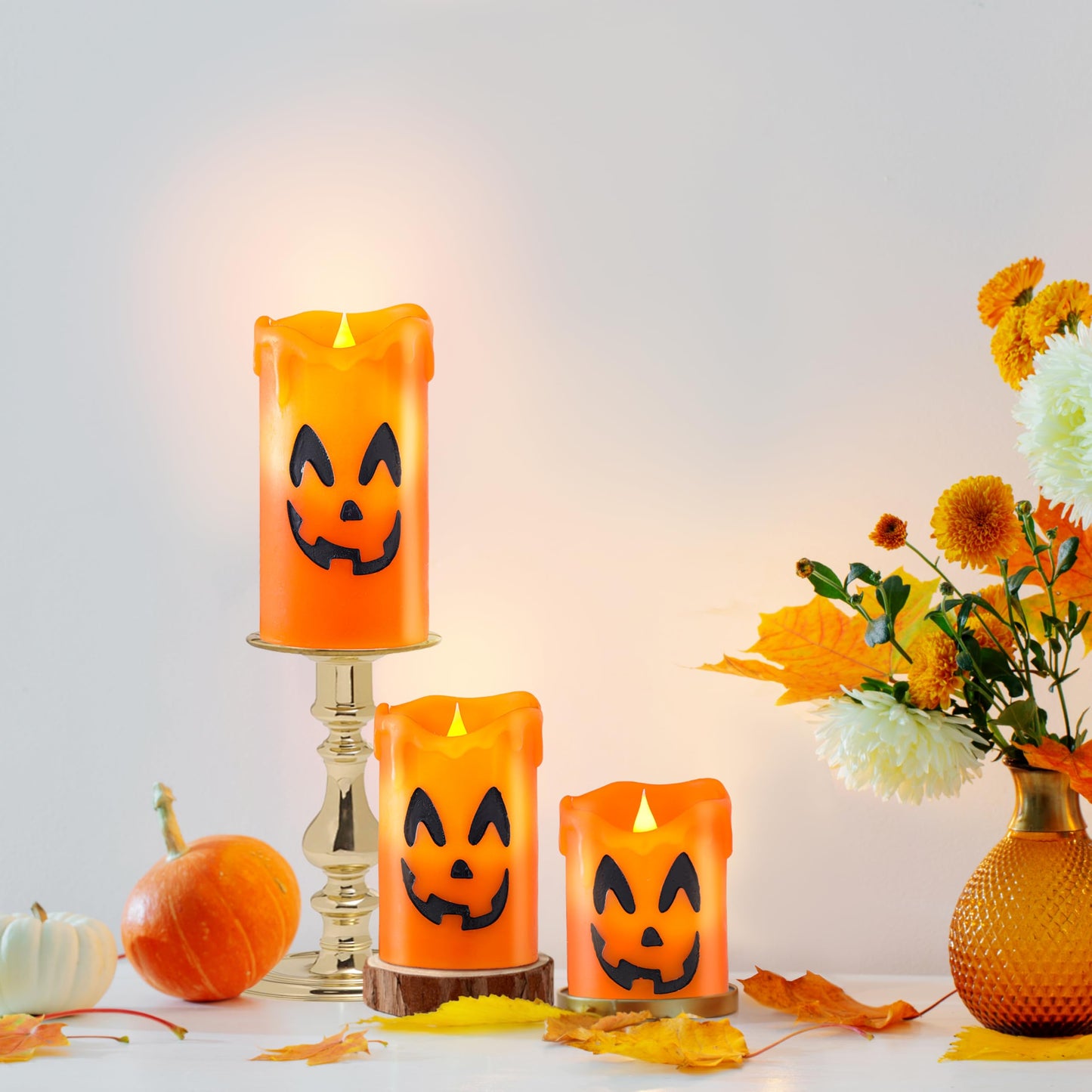 LCZLUMIPRO Halloween Candles Flameless Ghost Face Decor, Orange Pumpkin Dripping Real Wax Battery Operated LED Pillar Candles for Halloween Fall Indoor Table Dinner Decorations, Set of 3(3" x 4/5/6")