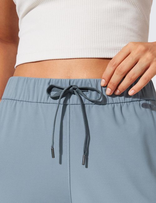 CRZ YOGA 4-Way Stretch Workout Joggers for Women 28" - Casual Travel Athletic Pants with Pockets Belgian Blue Medium