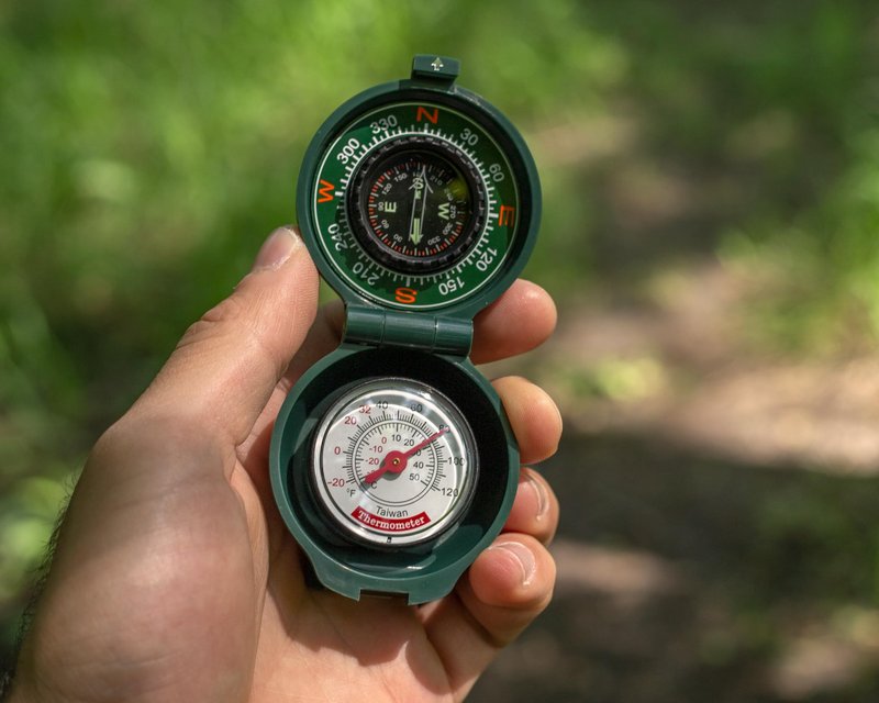 Coghlan's Compass with Thermometer for Hiking, Camping, and Outdoor Navigation – Compact and Lightweight Survival Gear with Luminous Dial for Easy Direction Reading