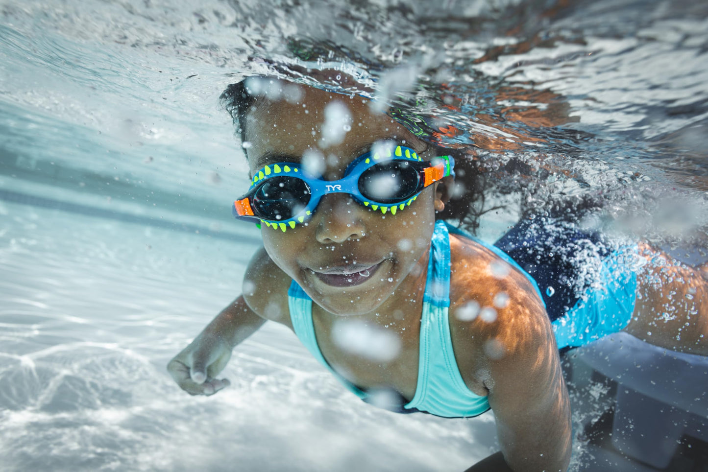 TYR Swimple Tie-Dye Kids' Swim Goggles - Non-Mirrored Swimming Goggles for Competitive Training and Recreation - Anti-Fog, UVA/UVB Protection, Watertight Seal - Clear/Blue/Orange