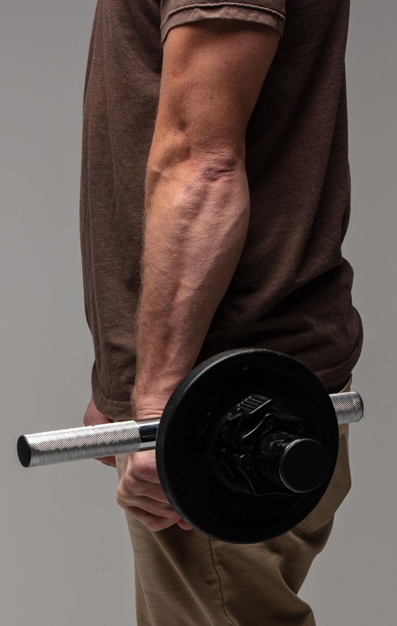 The Strong Arm - *ORIGINAL* Forearm and Wrist Strengthener, Grip Trainer, Forearm exerciser, wrist bar, hand barbell, forearm extensors trainer, Most Versatile Forearm Tool, USA SMALL BUSINESS ORIGINAL- NON CHINESE KNOCK OFF.