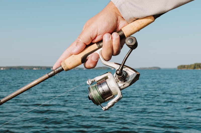 Pflueger Trion Spinning Reel, Size 20 Fishing Reel, Right/Left Handle Position, Graphite Body and Rotor, Corrosion-Resistant, Aluminum Spool, Front Drag System,Silver