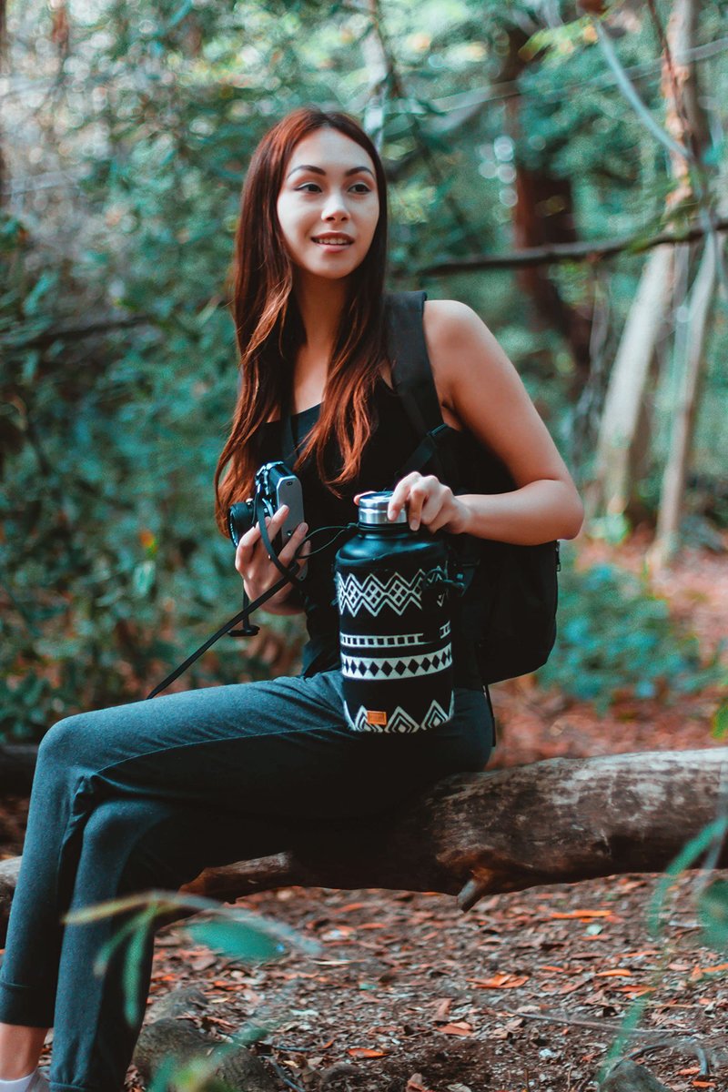 Water Bottle Holder w/Strap | Bottle Sleeve Carrier for Walking, Backpacking | Hydro and Iron Flask Sling Bag | Bottle Protector for Beer Water Coffee | Camping Accessories (64 oz, Obsidian Black)